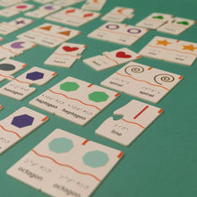 Load image into Gallery viewer, Memory Puzzles: Shapes is a matching puzzle game with tactile printing, English, and Braille. For puzzlers with visual impairment. 
