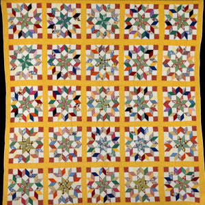 Ochre Carpenter's Wheel Quilt